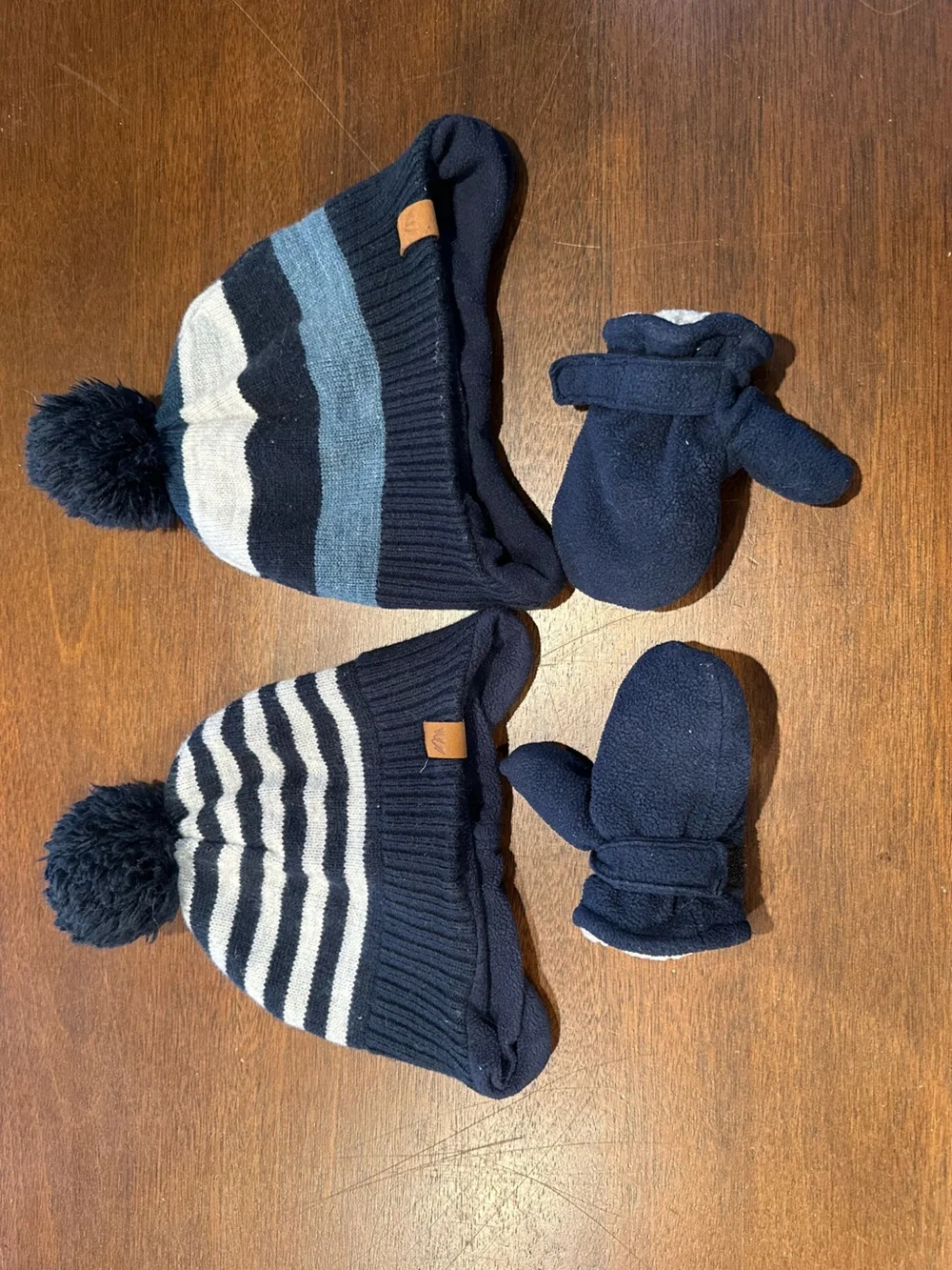 boys winter hats (2) and one pair of mittens toddler size